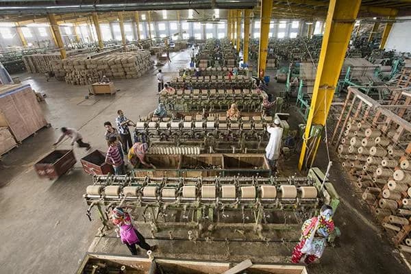 Jute spinning frames on the mill floor